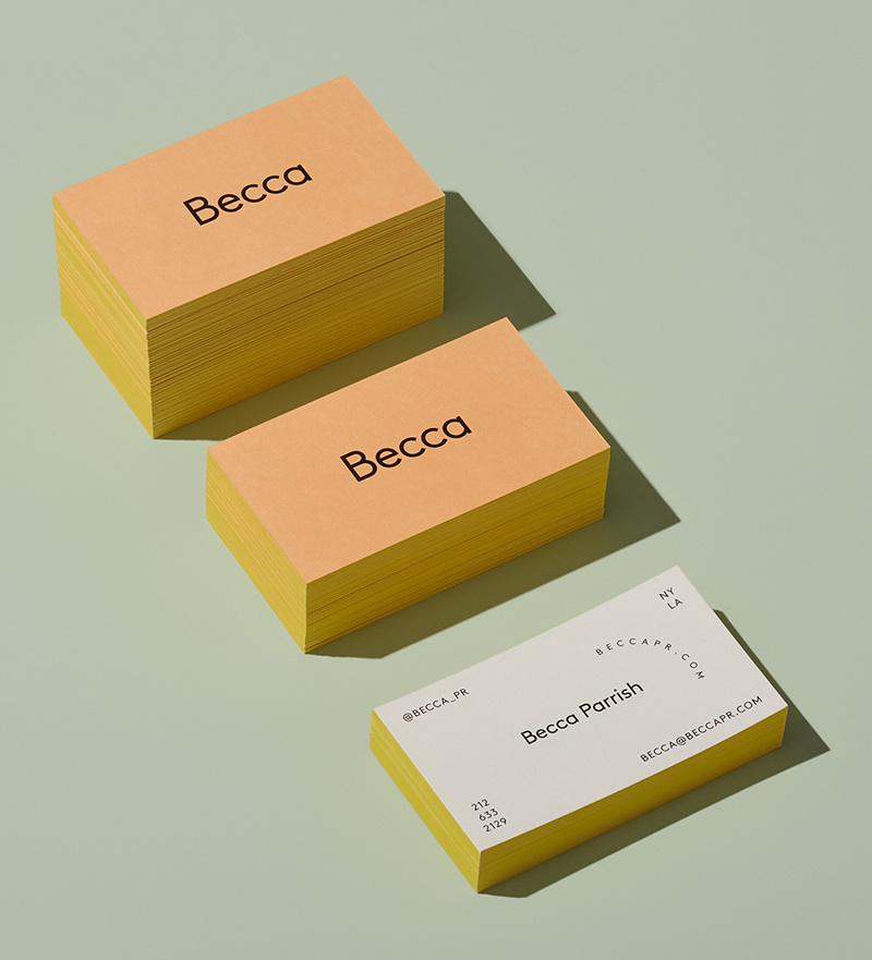 stacks of Becca business cards