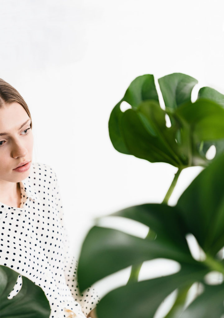 Woman with plant