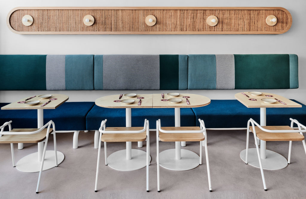 Banquette with tables and chairs in a restaurant