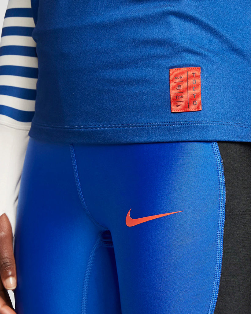 Woman in 2019 Tokyo Marathon for Nike by LMNOP apparel.