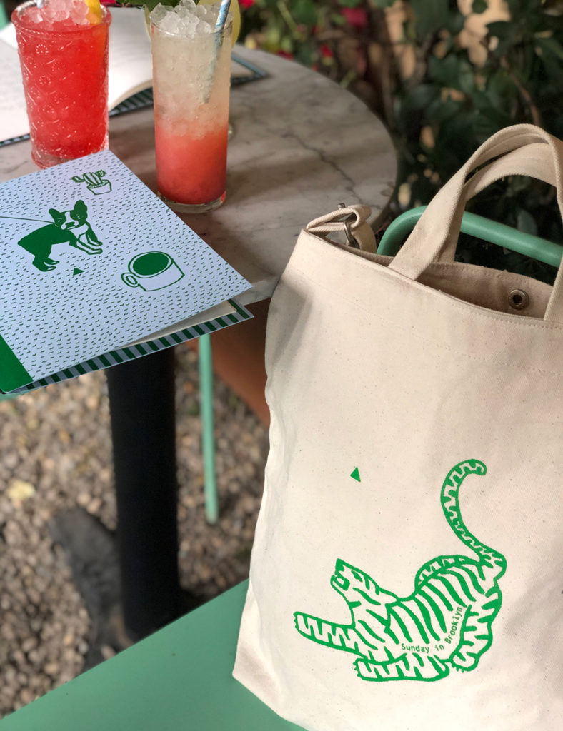 Sunday in Brooklyn tote and menu with drinks
