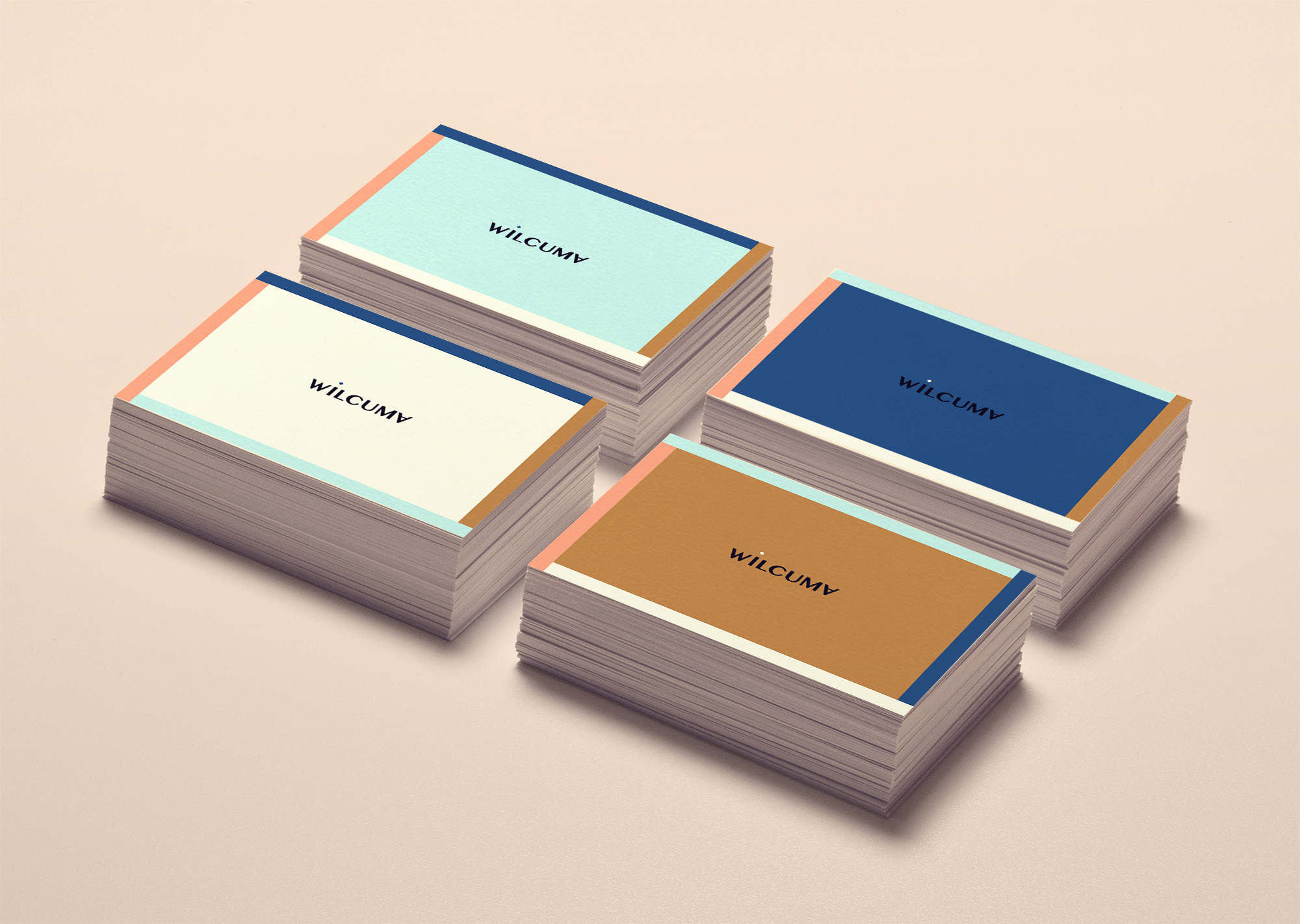 stacks of Wilcuma business cards