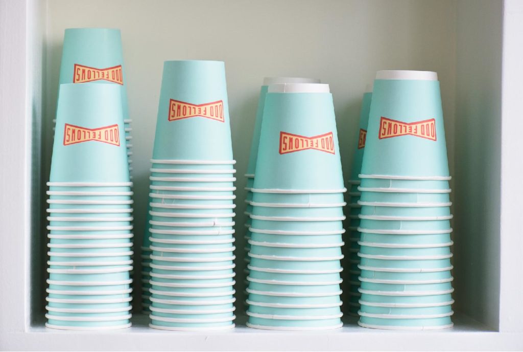 stacks of OddFellows coffee cups